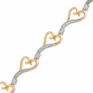 Серебряный браслет с вставками в форме сердечек и круглыми бриллиантами